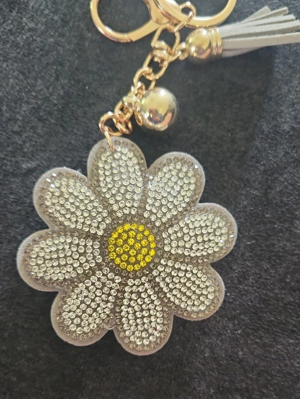 Gold & Crystal Daisy Keychain with Gray Tassel and Yellow Center